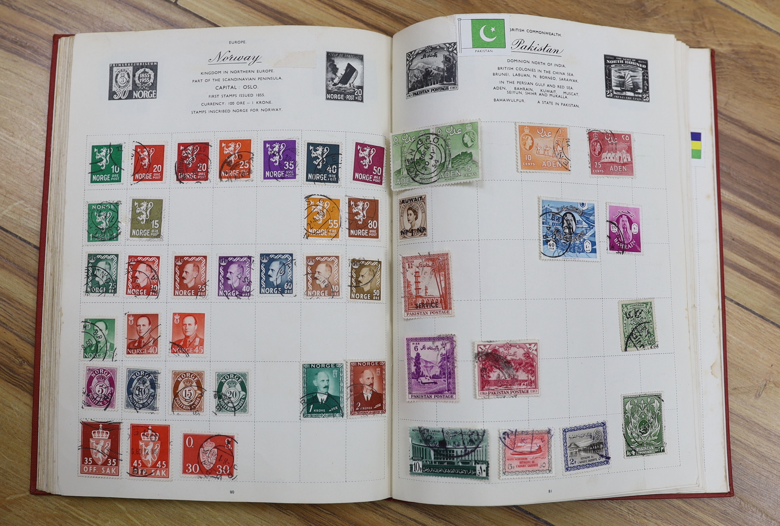 A collection of stamps and cigarette cards in two boxes